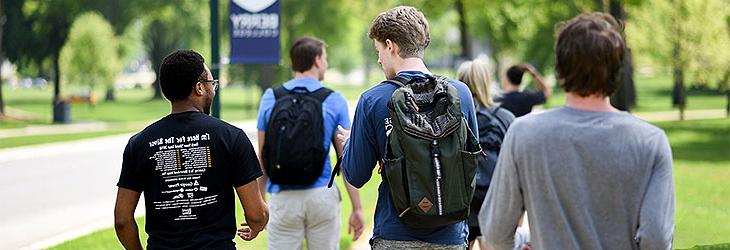 Various students walking through campus